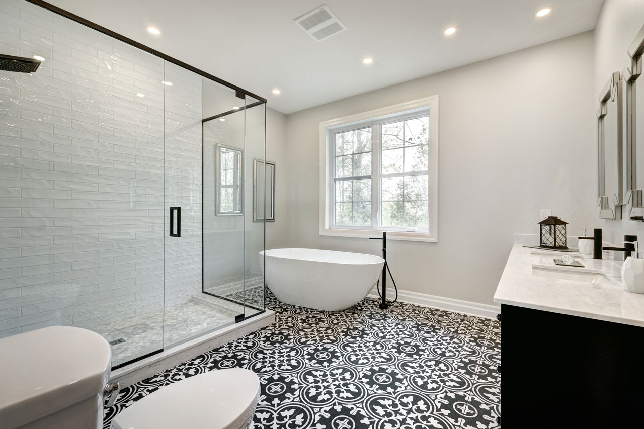 Completed bathroom renovation with walk-in shower and contemporary tile design by ParrotWerks Construction in San Diego