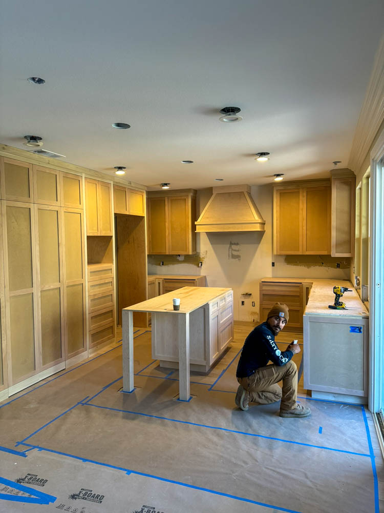 Kitchen cabinet installation in progress by ParrotWerks Construction in San Diego