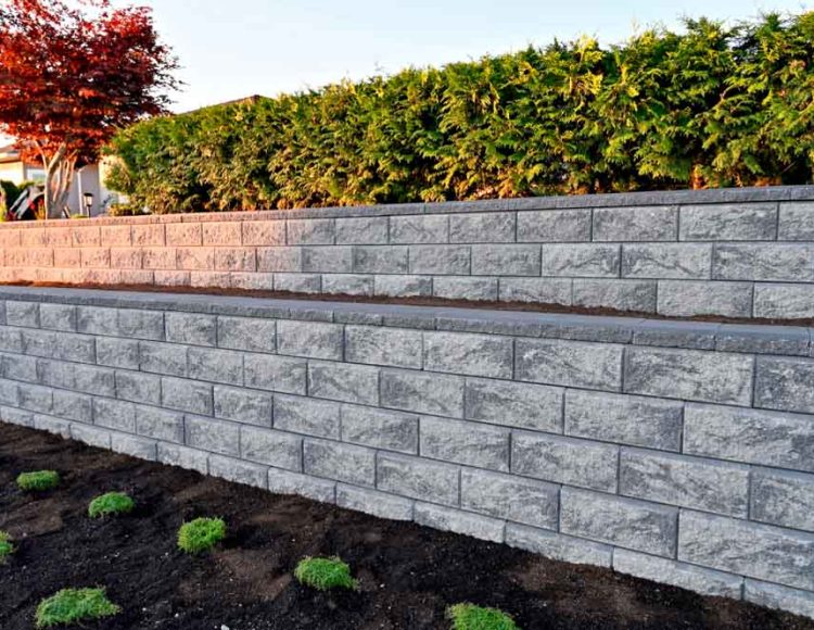 Engineered retaining wall construction with drainage system by ParrotWerks Construction in San Diego